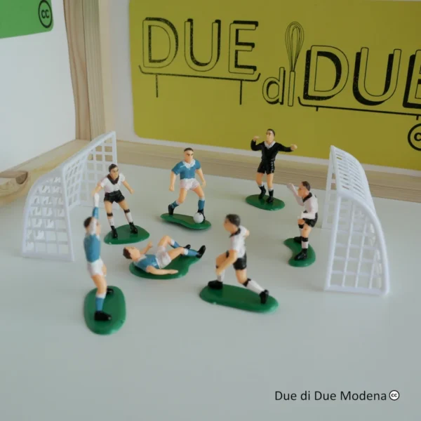 Giocatori di calcio e porte